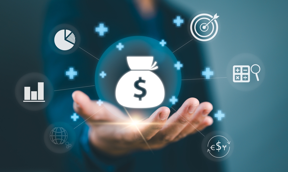 Open hand holding a glowing money bag surrounded by finance icons
